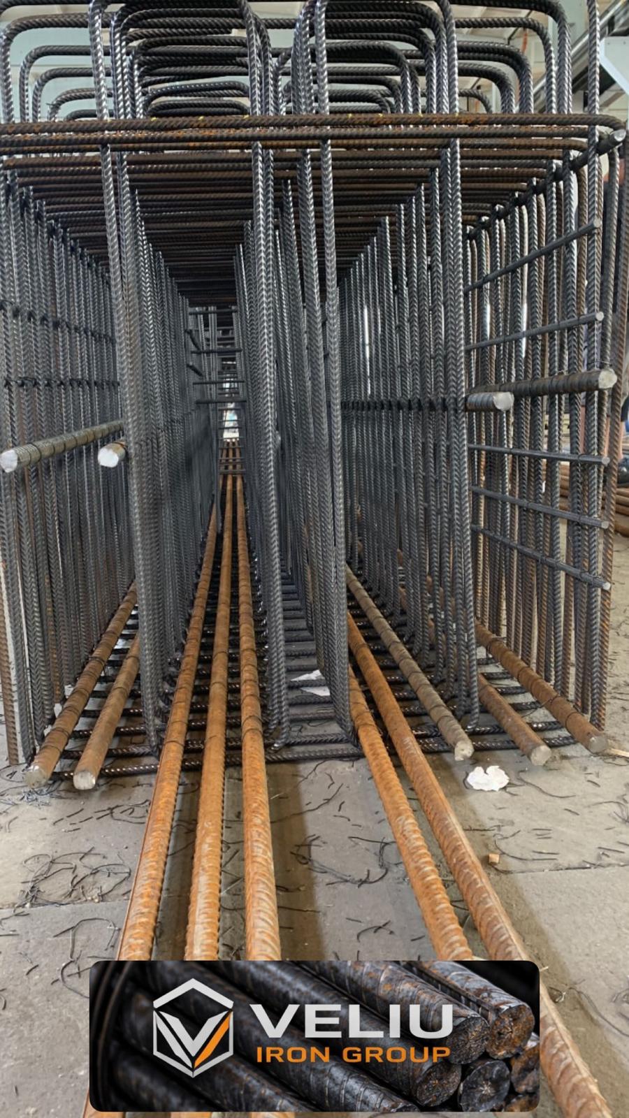 Prefabricated rebar cages with Veliu Iron Group branding
